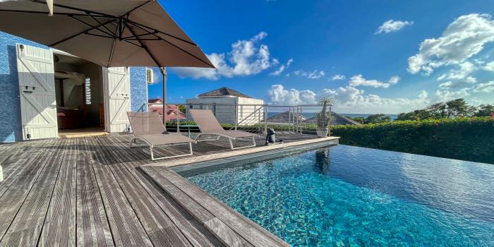 Location villa 3 chambres 6 personnes piscine et vue mer plage 150m à Ste Anne en Guadeloupe 