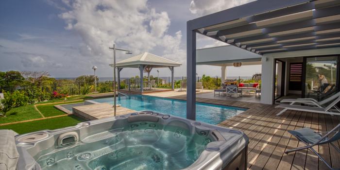 Location Guadeloupe - Villa d'architecte avec vue mer piscine et spa 4 chambres pour 8 personnes 