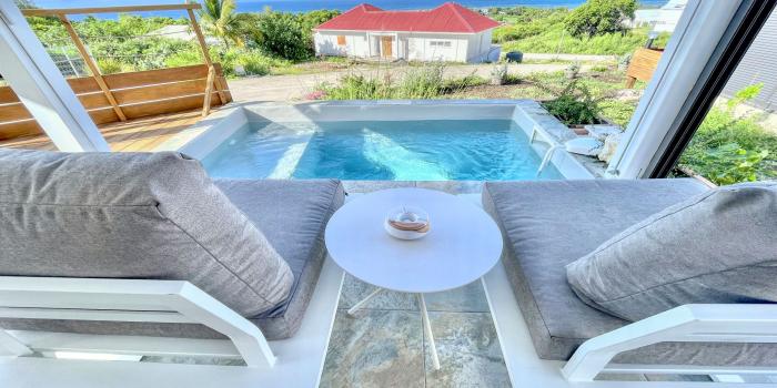 Location bungalow piscine Grand Bourg Marie Galante - Vue Mer 