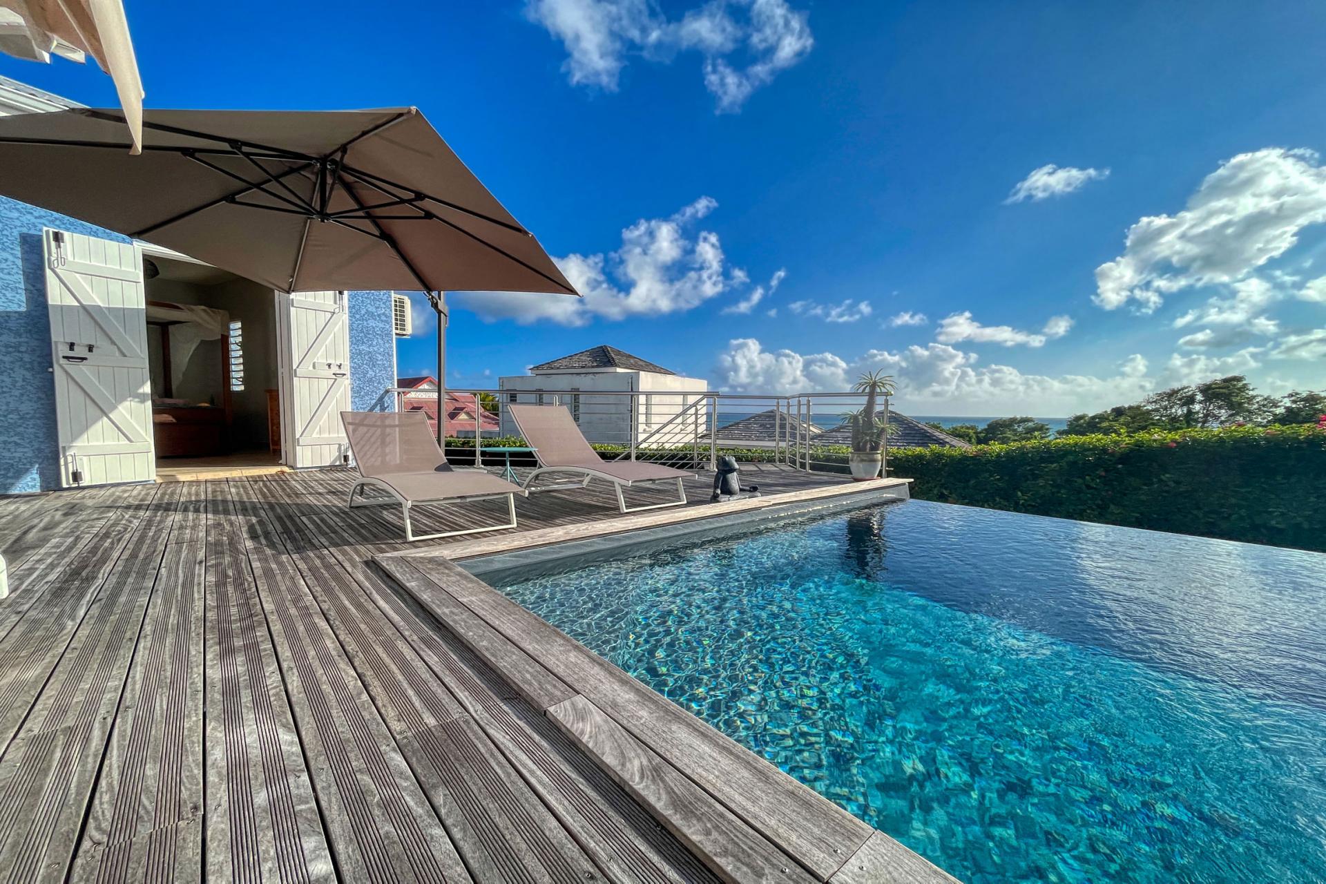 Location villa 3 chambres 6 personnes piscine et vue mer plage 150m à Ste Anne en Guadeloupe 