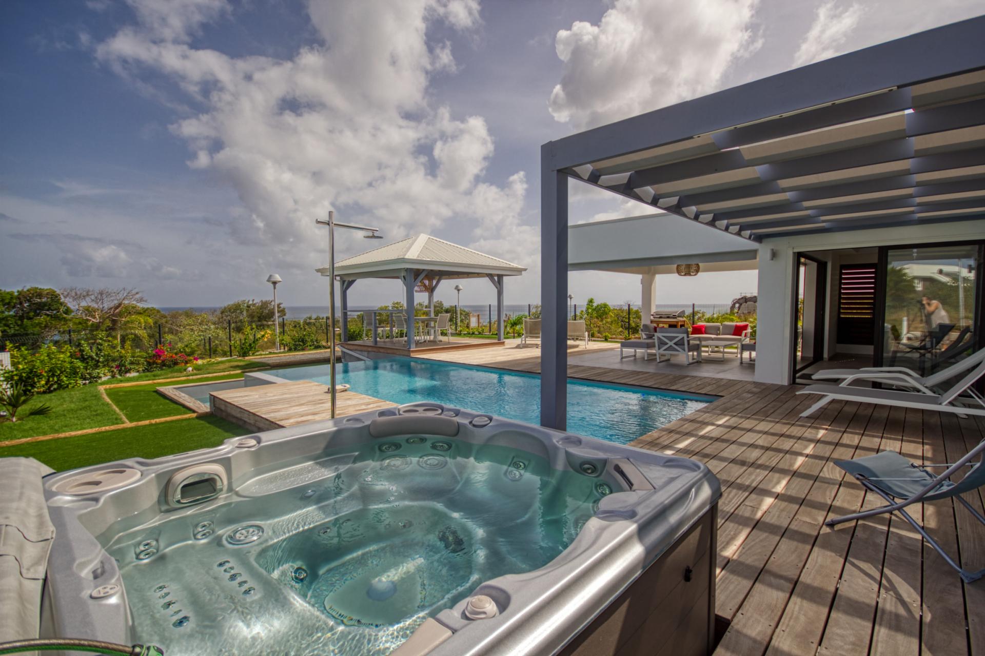 Location Guadeloupe - Villa d'architecte avec vue mer piscine et spa 4 chambres pour 8 personnes 