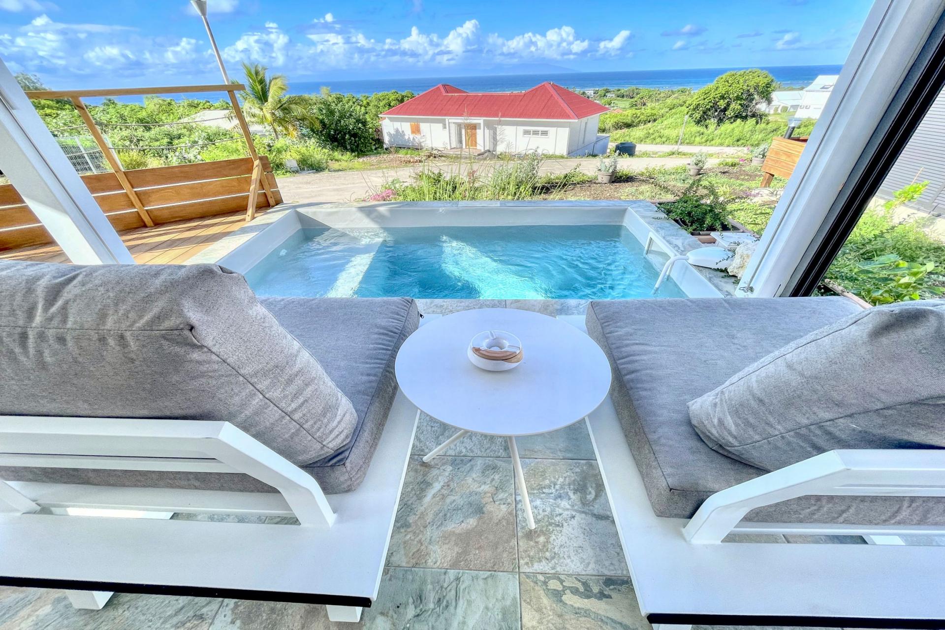 Location bungalow piscine Grand Bourg Marie Galante - Vue Mer 