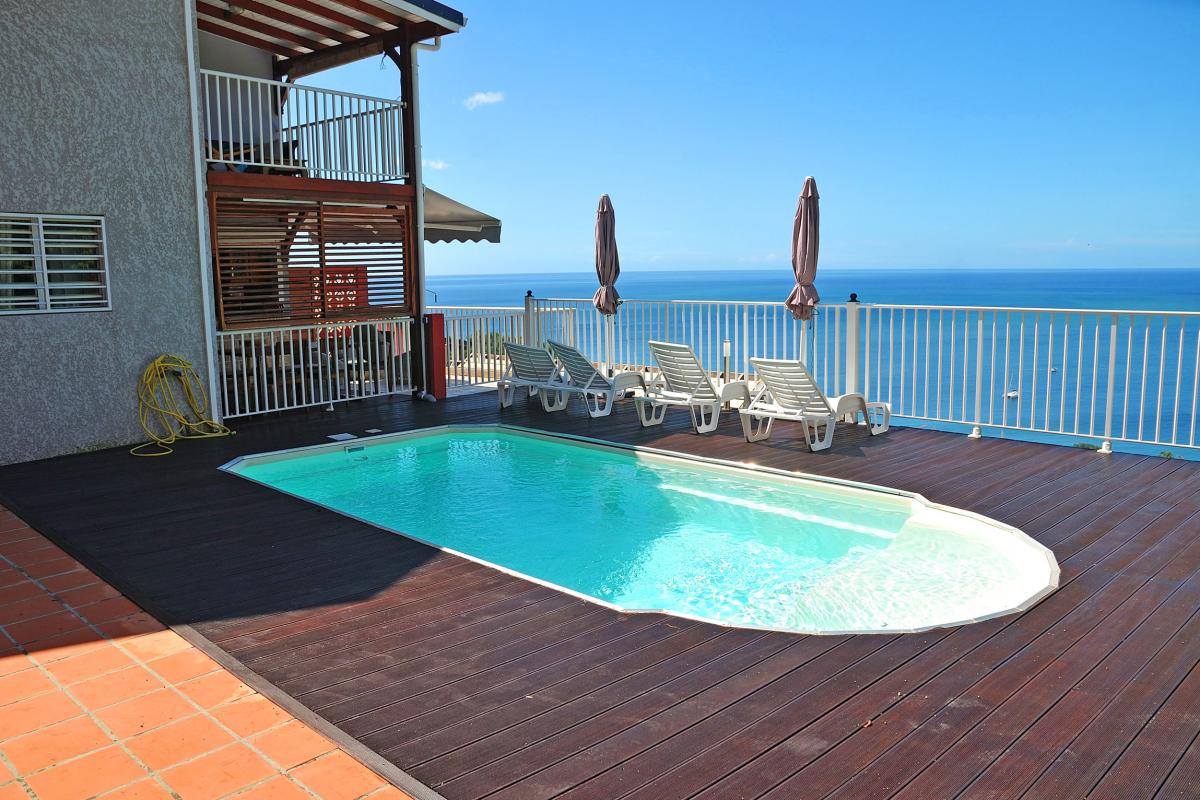 Villa alpinia 2 chambres 4 personnes à louer à Bouillante en Guadeloupe vue mer et ilets Pigeon