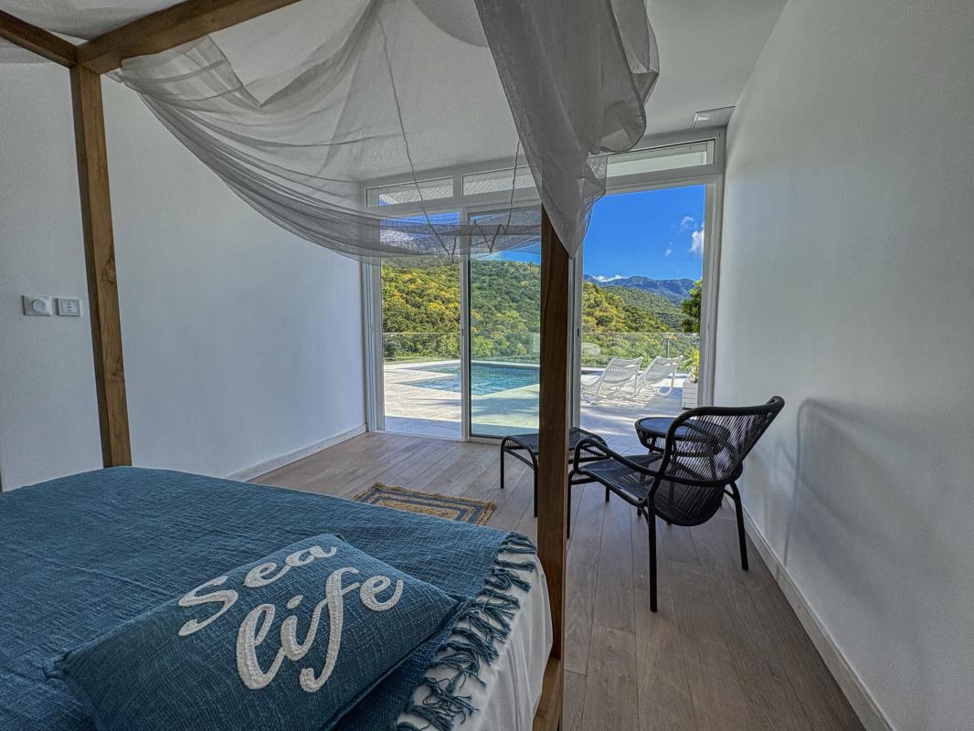 Location villa piscine Bouillante Guadeloupe_Chambre 4 RDC