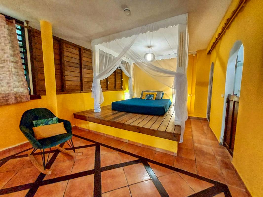 Location villa coluche pour 11 personnes avec vue mer dans jardin botanique deshaies guadeloupe