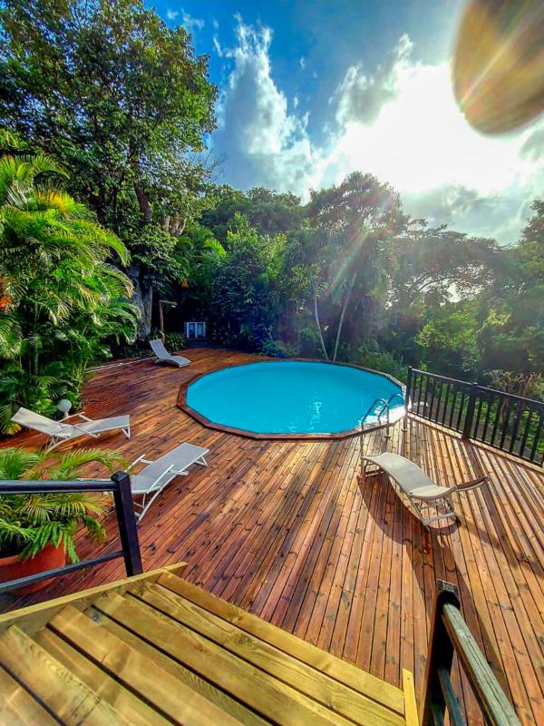 Location villa coluche pour 11 personnes avec vue mer dans jardin botanique deshaies guadeloupe