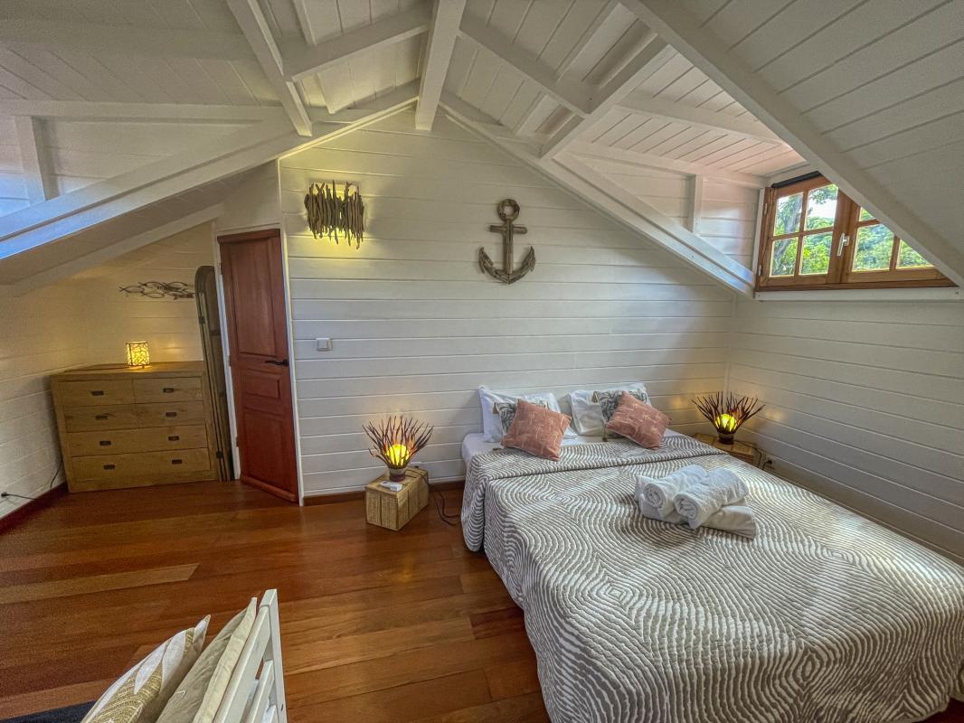 Location Villa 12 personnes Deshaies Guadeloupe-chambre etage