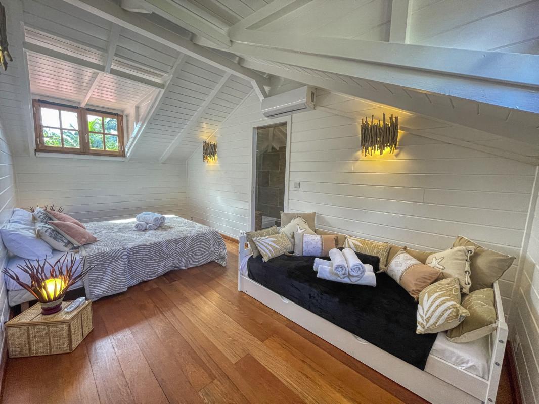 Location Villa 12 personnes Deshaies Guadeloupe-chambre etage