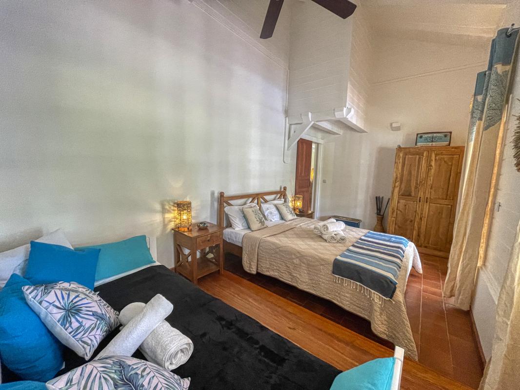 Location Villa 12 personnes Deshaies Guadeloupe-chambre rdc