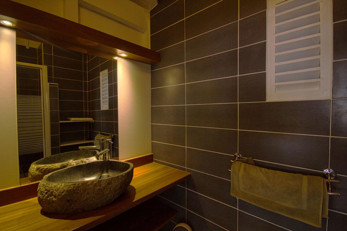 Location villa de luxe et vue mer 5 chambres pour 12 personnes avec piscine à Deshaies en Guadeloupe 