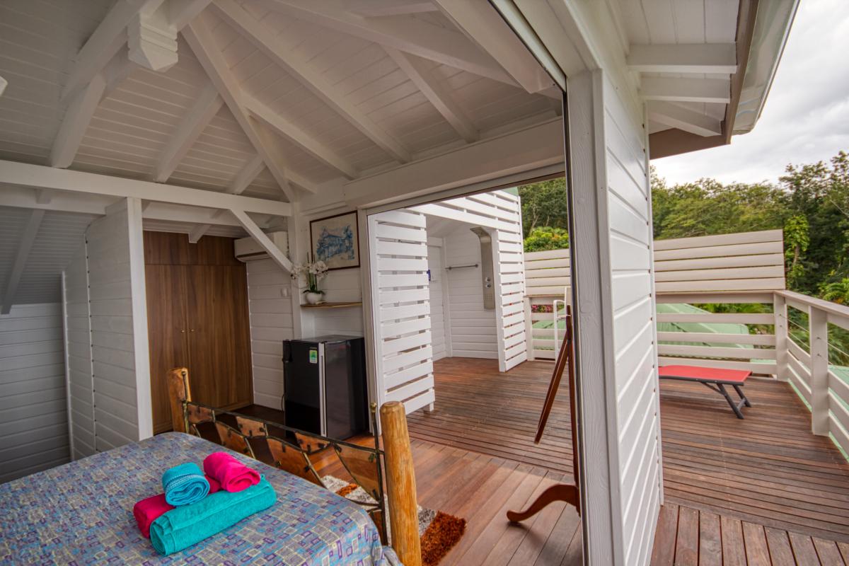 Location villa de luxe et vue mer 5 chambres pour 12 personnes avec piscine à Deshaies en Guadeloupe 