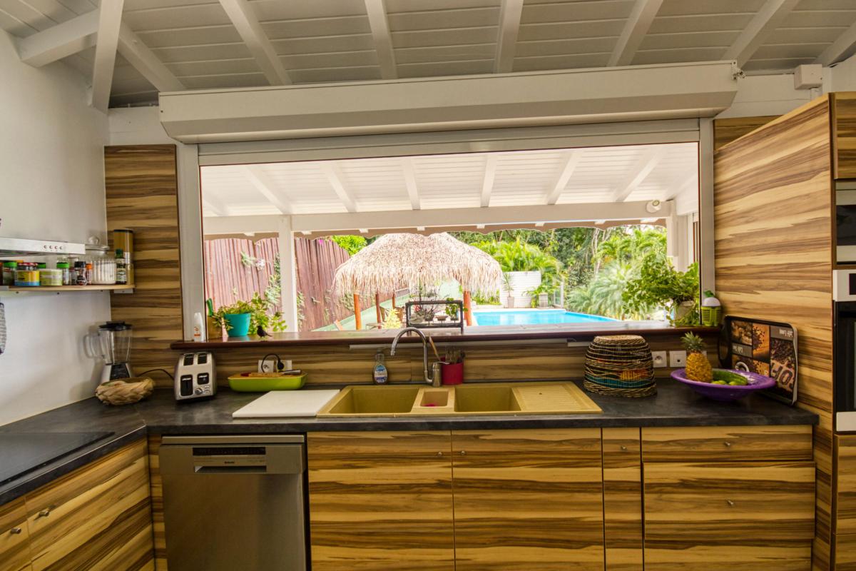 Location villa de luxe et vue mer 5 chambres pour 12 personnes avec piscine à Deshaies en Guadeloupe 