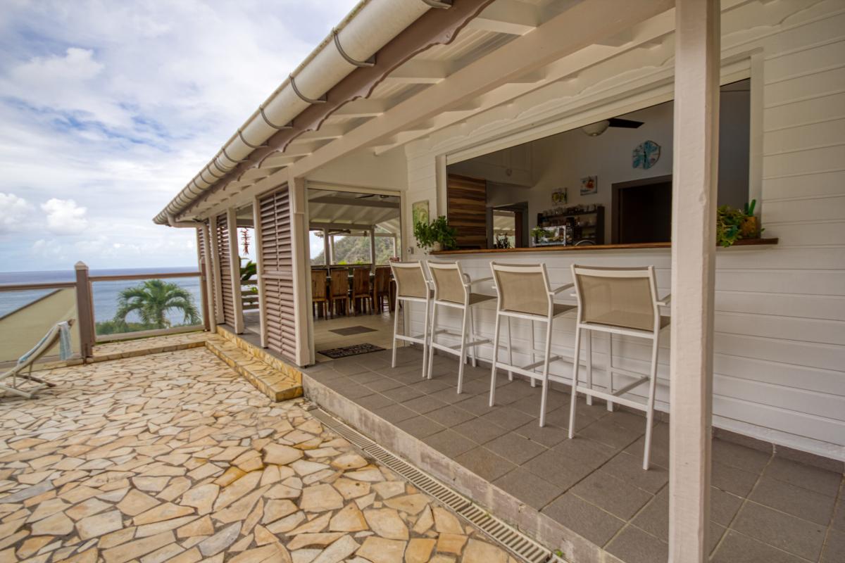 Location villa de luxe et vue mer 5 chambres pour 12 personnes avec piscine à Deshaies en Guadeloupe 