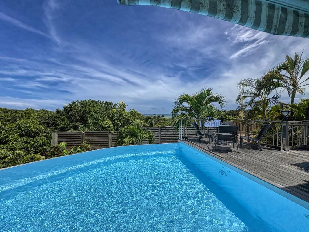 Location villa de standing vue mer à Deshaies proximité plage pour 12 personnes