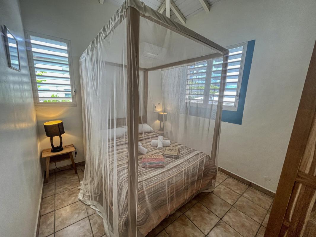 Villa vue mer à Deshaies Guadeloupe - Chambre 1 appartement