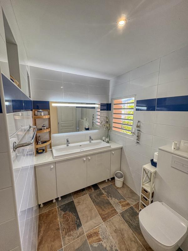 Villa vue mer à Deshaies Guadeloupe - Chambre 1 sdd