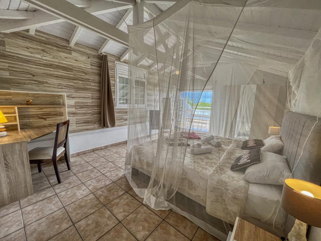 Villa vue mer à Deshaies Guadeloupe - Chambre etage