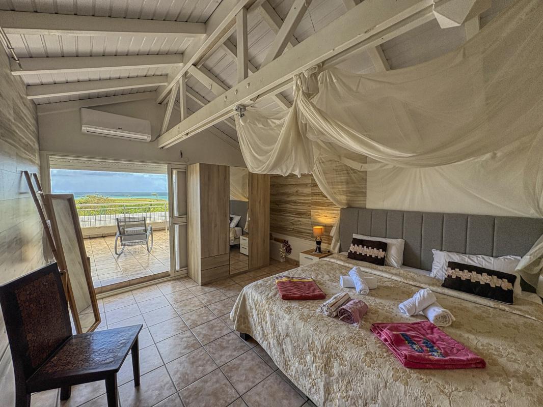 Villa vue mer à Deshaies Guadeloupe - Chambre etage