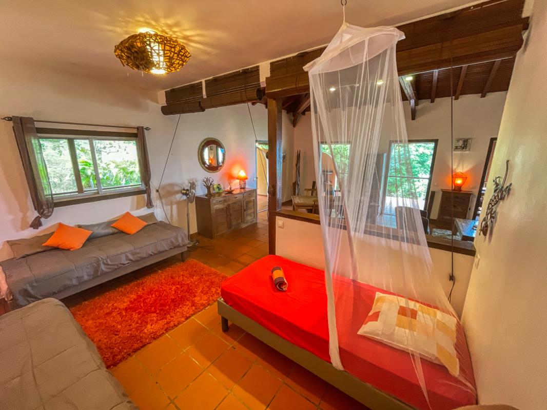 Location villa 2 chambres 6 personnes vue mer à Deshaies en Guadeloupe Jardin des Colibris