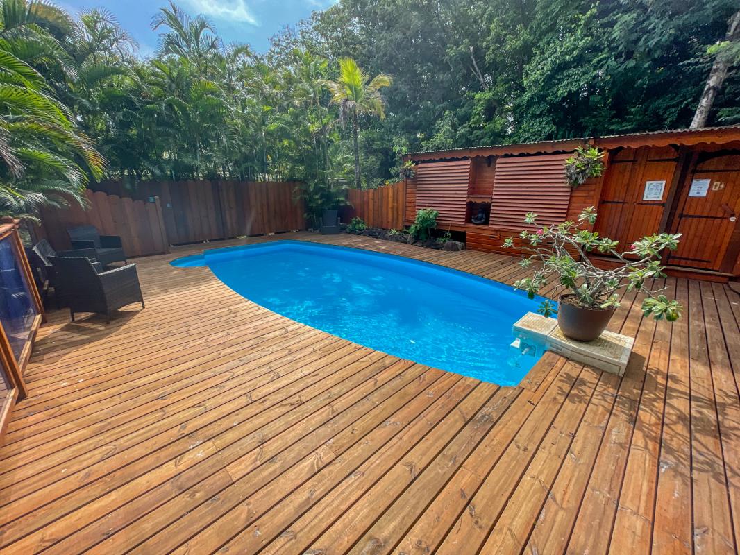 Location villa 2 chambres 6 personnes vue mer à Deshaies en Guadeloupe Jardin des Colibris