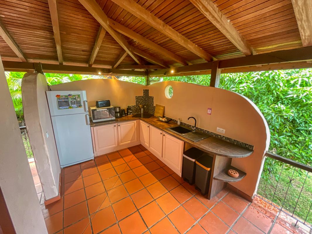 Location villa 2 chambres 6 personnes vue mer à Deshaies en Guadeloupe Jardin des Colibris