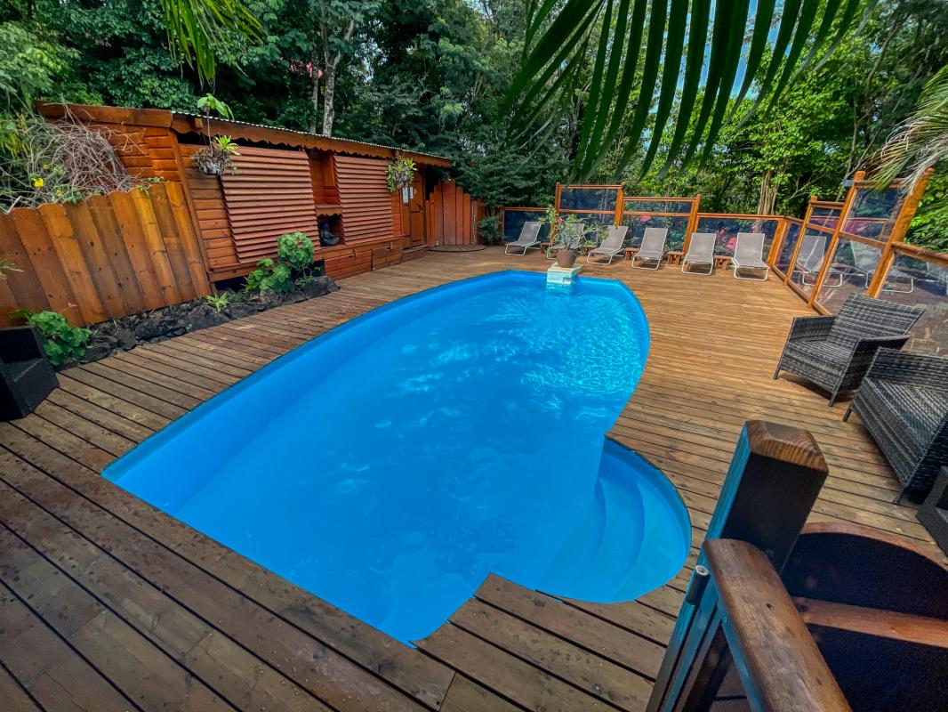 Location villa 2 chambres 4 personnes avec piscine à Deshaies en Guadeloupe Jardin des Colibris