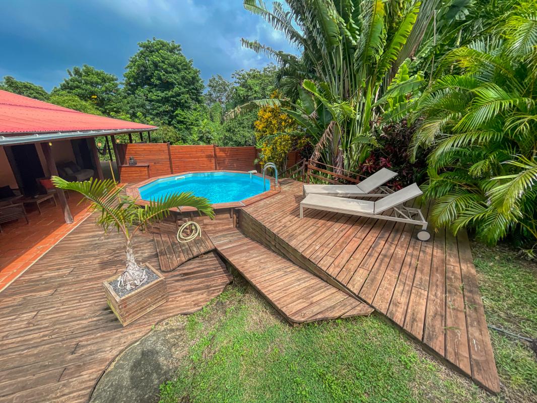 Location villa 2 chambres 4 personnes avec piscine à Deshaies en Guadeloupe Jardin des Colibris