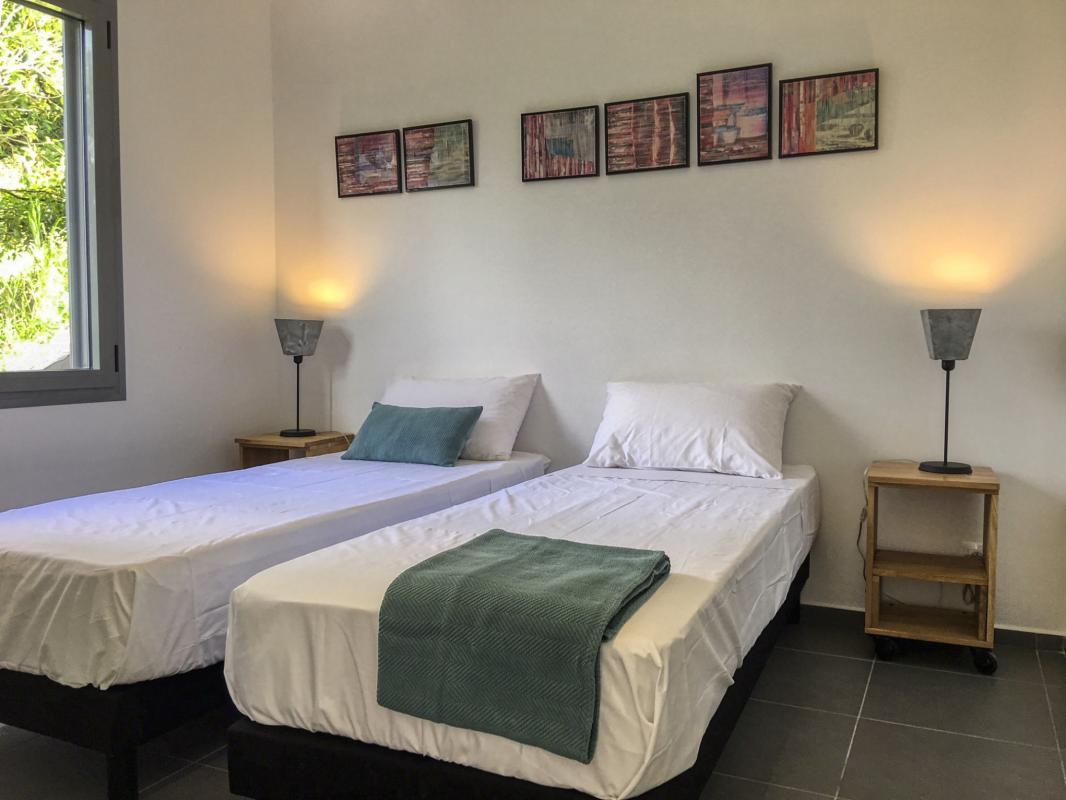 Location villa piscine Deshaies Guadeloupe_chambre 1