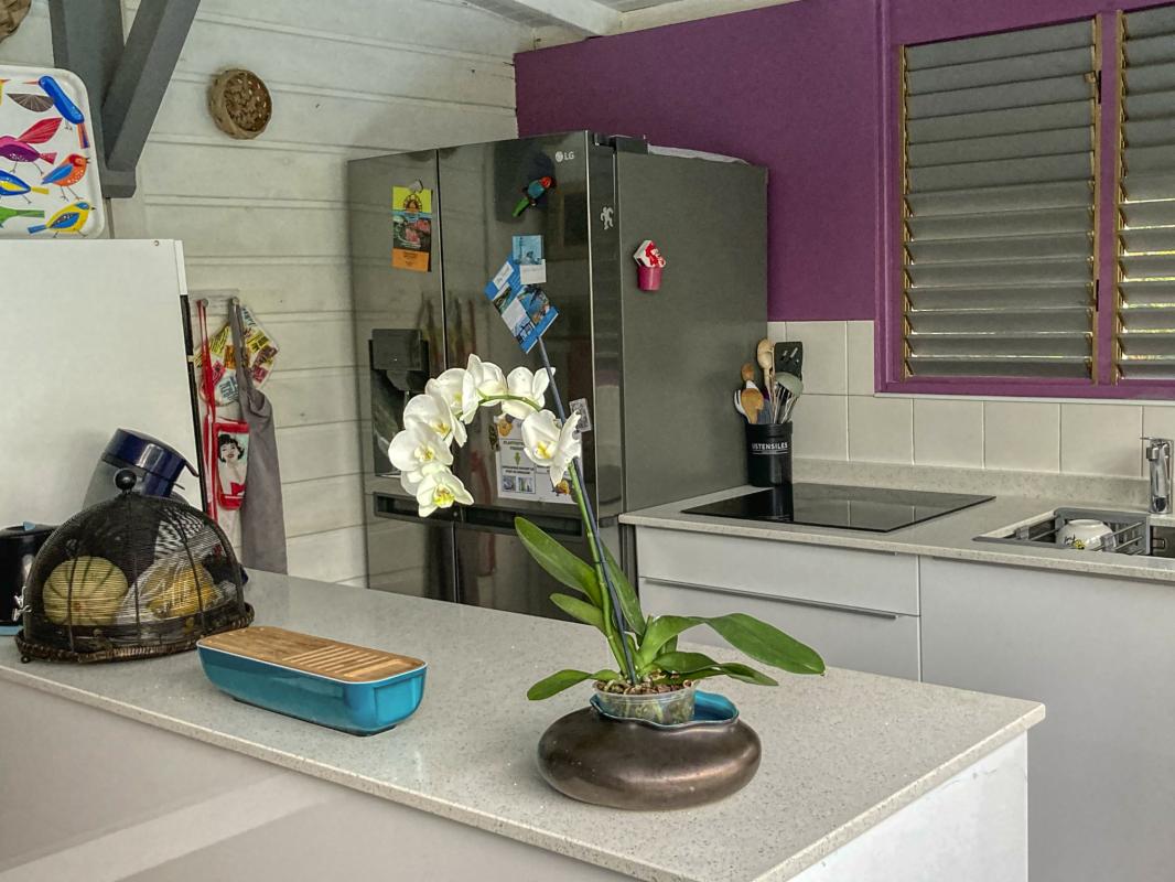 Location Villa Deshaies Guadeloupe piscine vue mer - cuisine