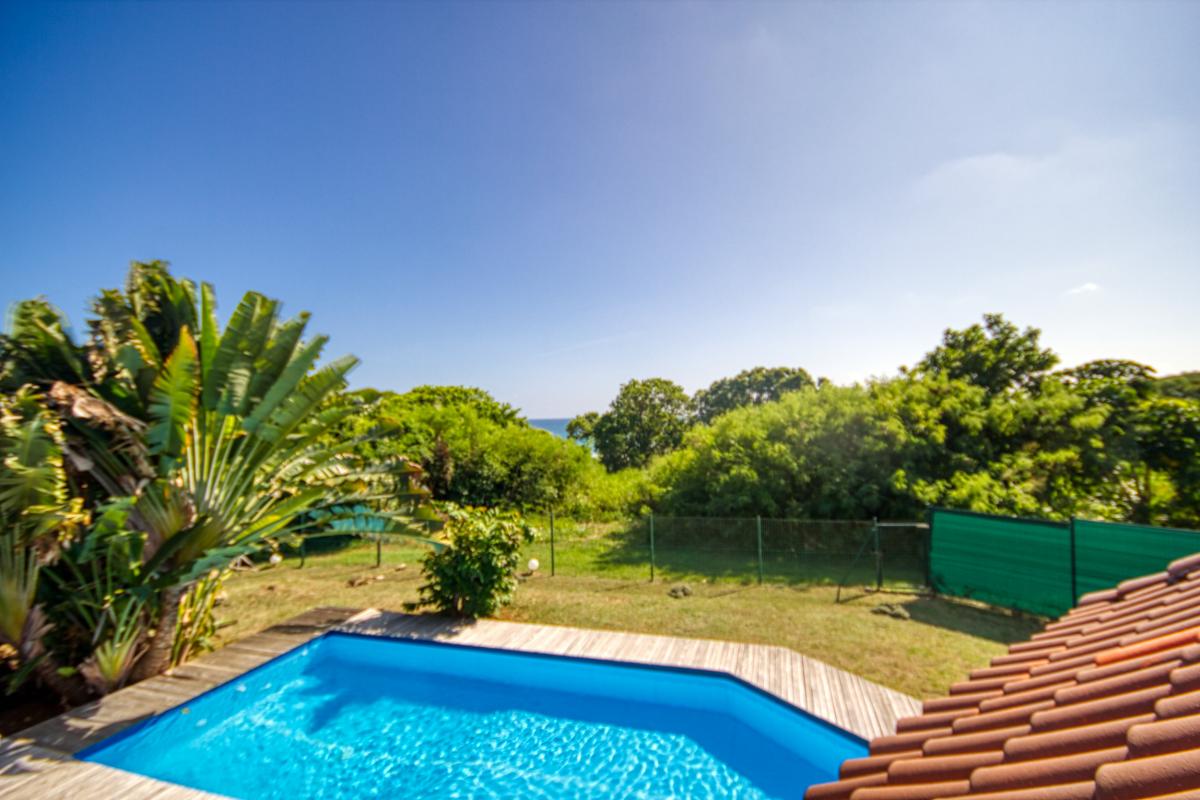 Location villa Guadeloupe Le Gosier 4 chambres 11 personnes vue et accés mer et piscine 