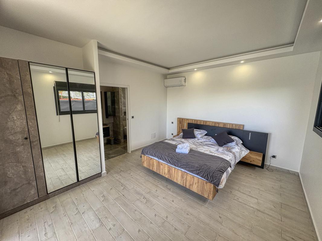 Location villa piscine Gosier Guadeloupe_Chambre 1