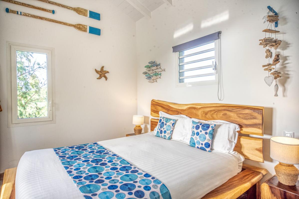 Location villa piscine accès et vue mer Le Moule Guadeloupe_chambre