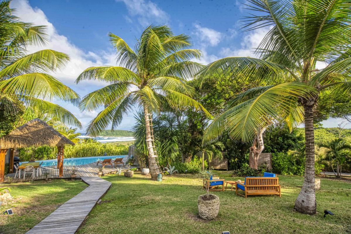 Location villa piscine accès et vue mer Le Moule Guadeloupe_jardin