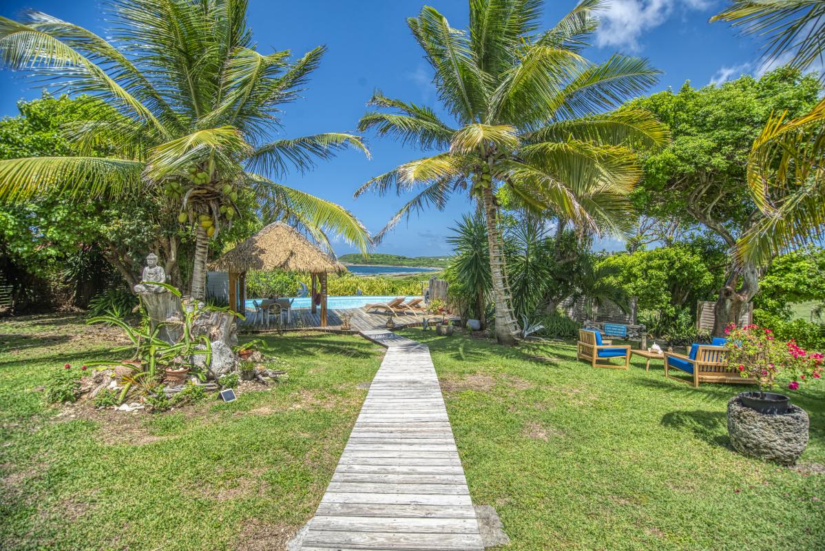 Location villa piscine accès et vue mer Le Moule Guadeloupe_jardin