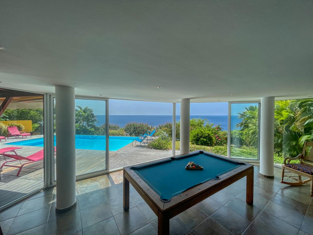 Location de villa 5 chambres 10 personnes avec piscine vue mer et accés mer à Pointe Noire en Guadeloupe