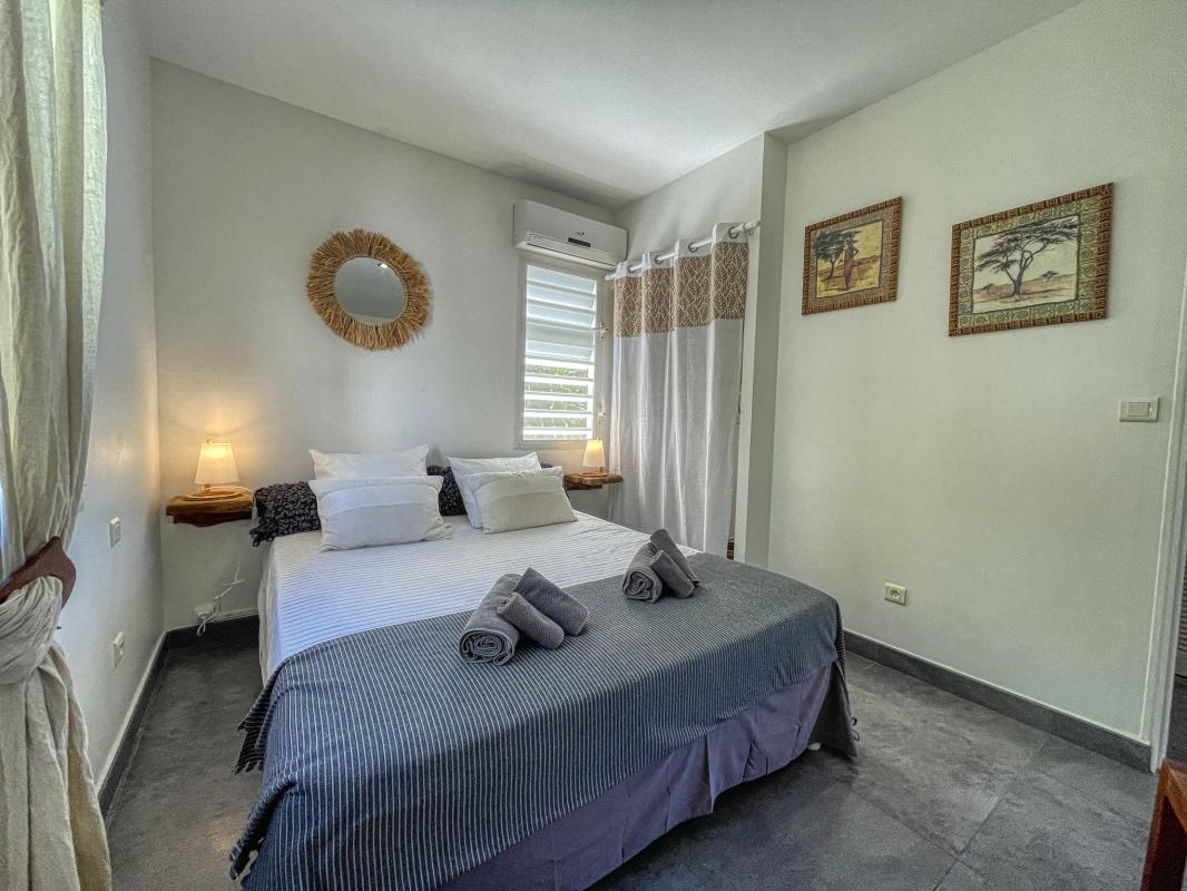 Villa à louer Sainte Anne Guadeloupe__chambre grise