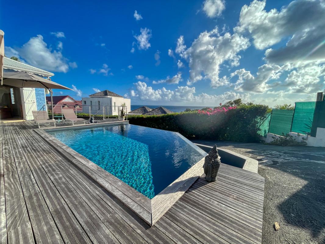 Location villa 3 chambres 6 personnes piscine et vue mer plage 150m à Ste Anne en Guadeloupe 