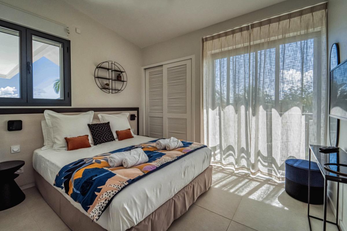 Location villa piscine vue mer 9 chambres Sainte Anne Guadeloupe_Chambre 3