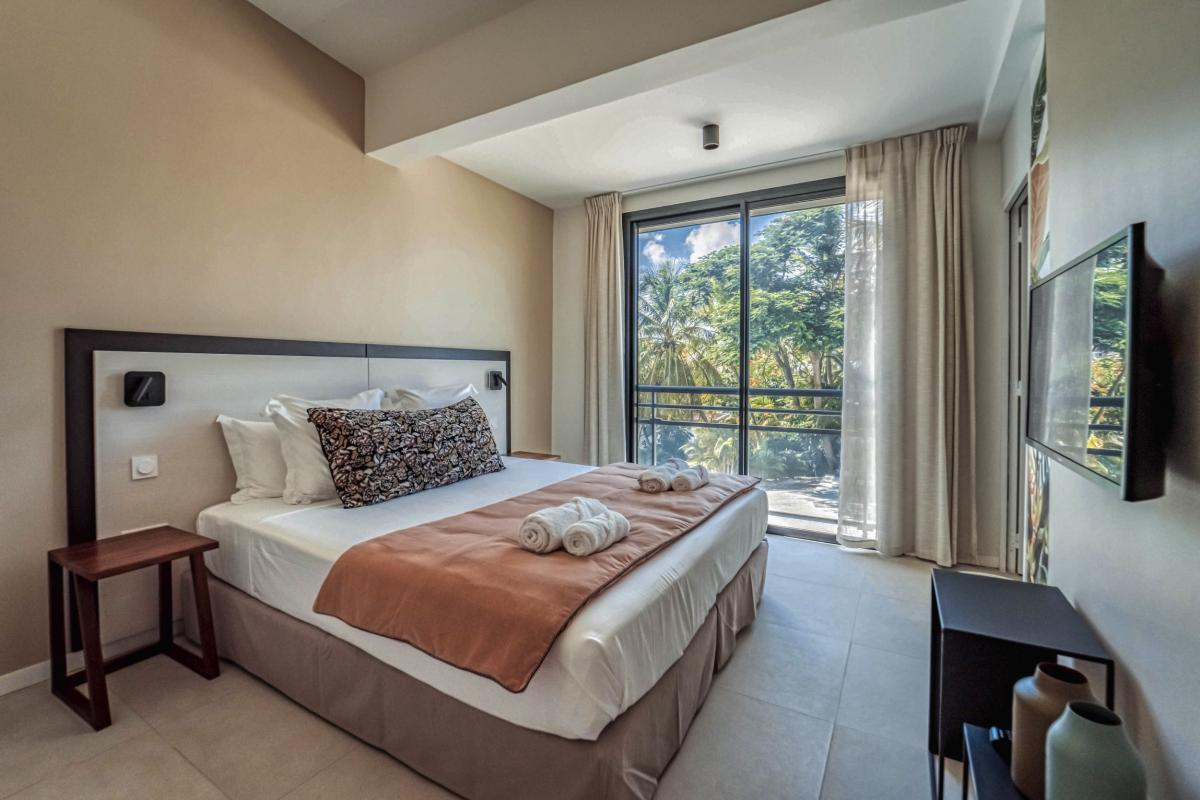 Location villa piscine vue mer 9 chambres Sainte Anne Guadeloupe_Chambre 6