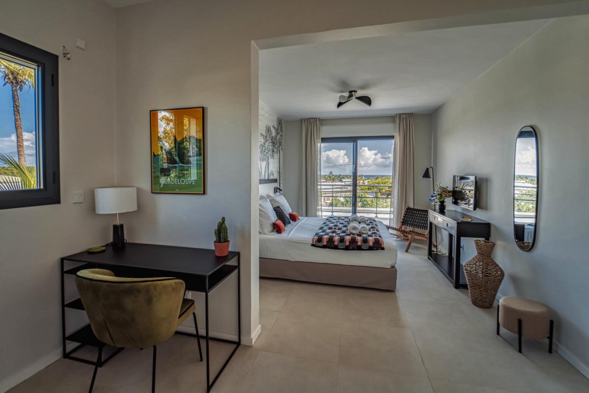 Location villa piscine vue mer 9 chambres Sainte Anne Guadeloupe_Chambre 7