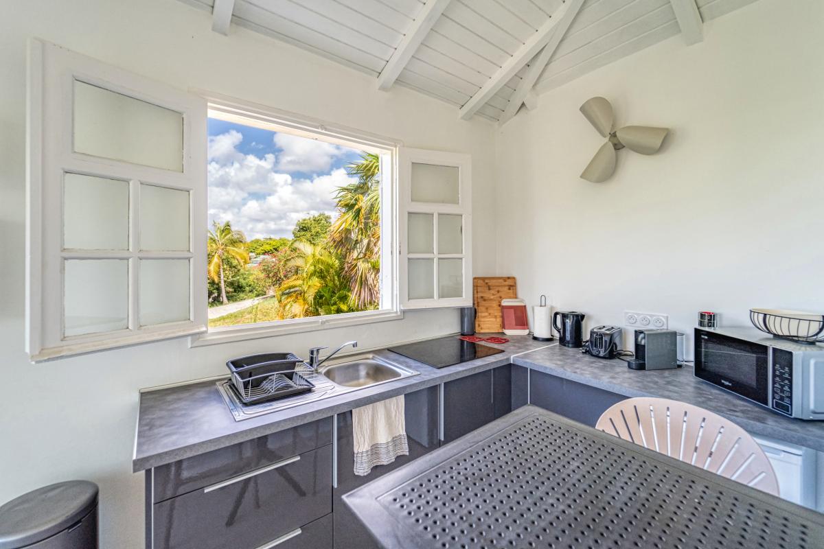 Location villa piscine vue mer 9 chambres Sainte Anne Guadeloupe_Studio 1