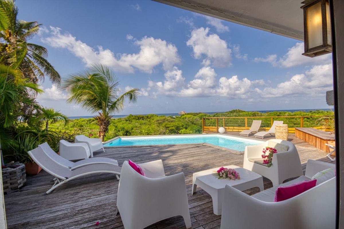 Location villa 2 chambres pour 4-6 personnes à St François en Guadeloupe avec vue mer et piscine