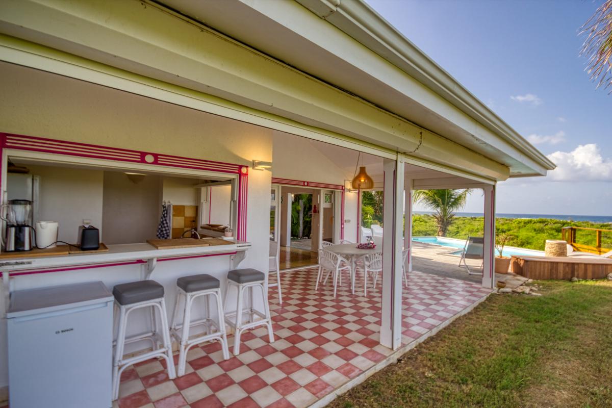 villa swimming pool and ocean view - bedroom 1