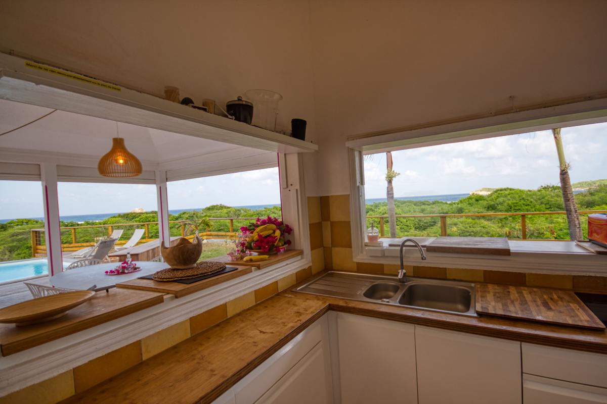 Location villa 3 chambres pour 4-6 personnes à St François en Guadeloupe avec vue mer et piscine