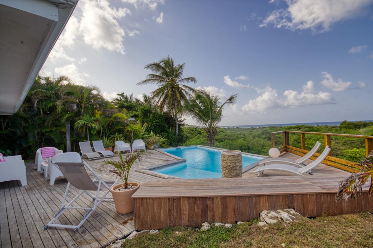 Location villa 3 chambres pour 4-6 personnes à St François en Guadeloupe avec vue mer et piscine