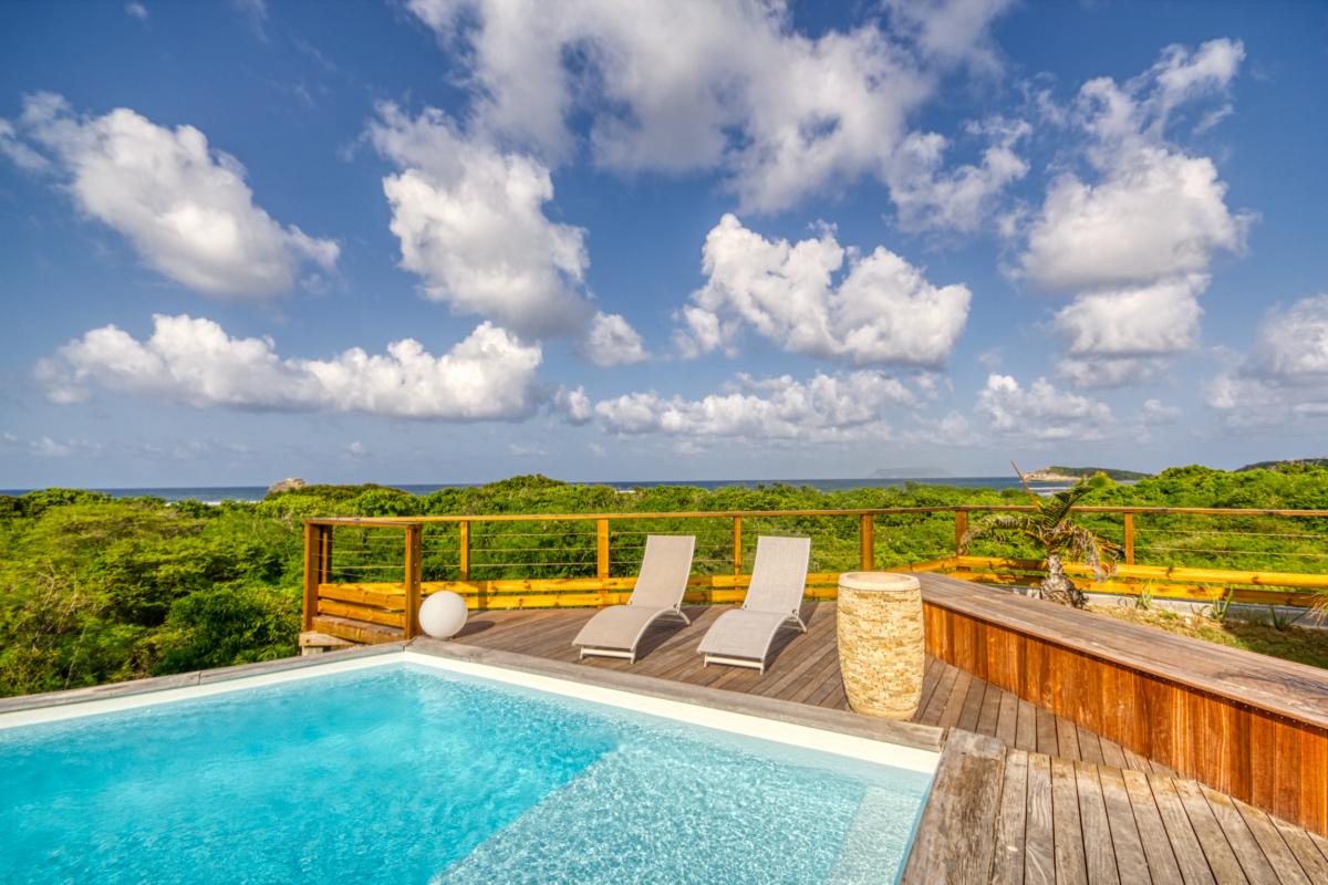 Location villa 3 chambres pour 4-6 personnes à St François en Guadeloupe avec vue mer et piscine