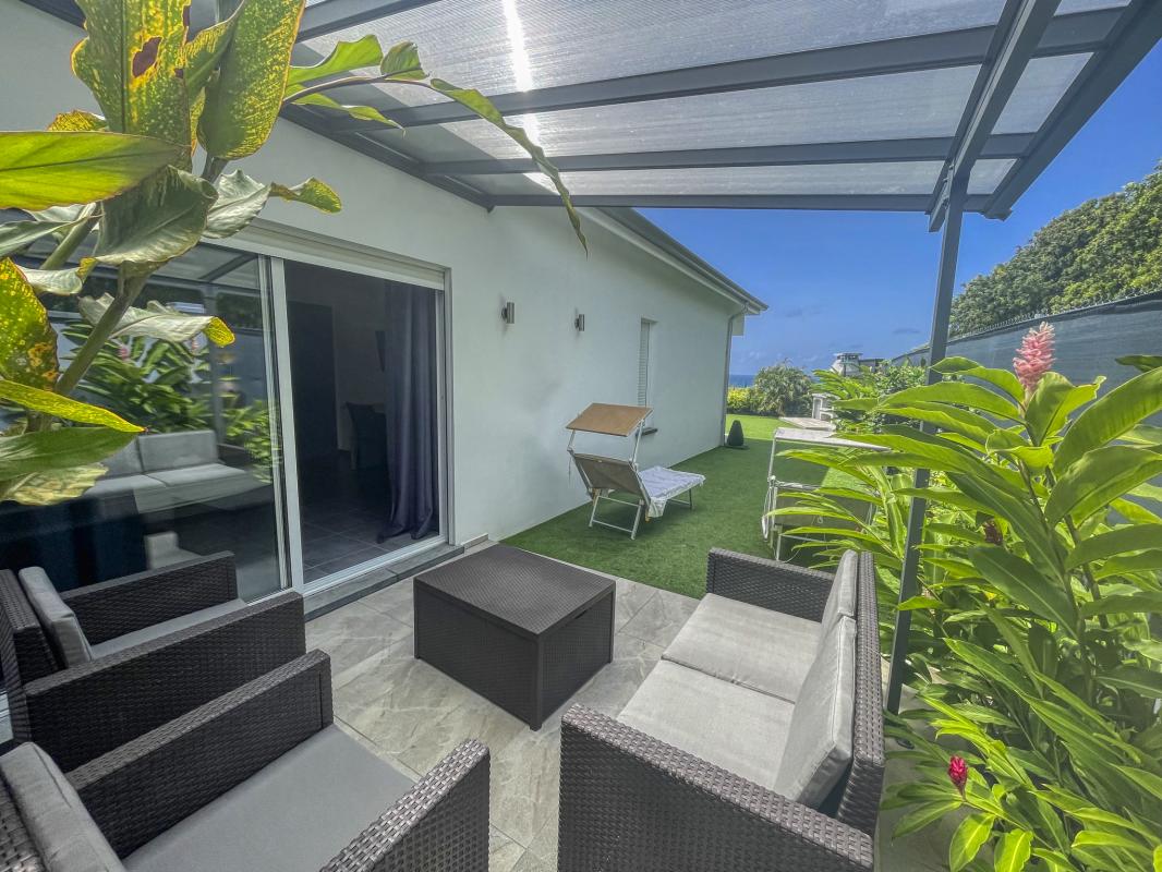 Location villa Saint François Guadeloupe-piscine vue mer-chambre jardin