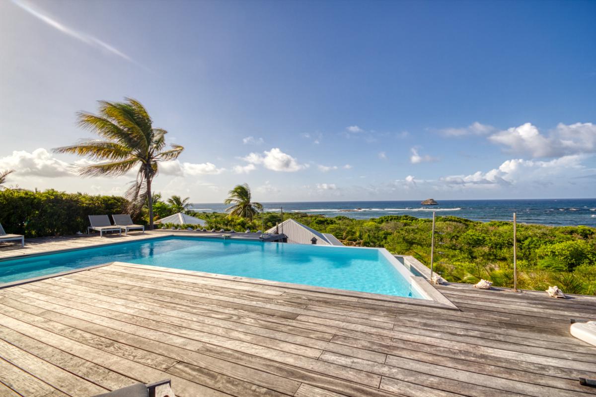 Location villa 3 chambres pour 6 personnes avec piscine vue mer et accés plge anse à la gourde Iguana Bay St François Guadeloupe 