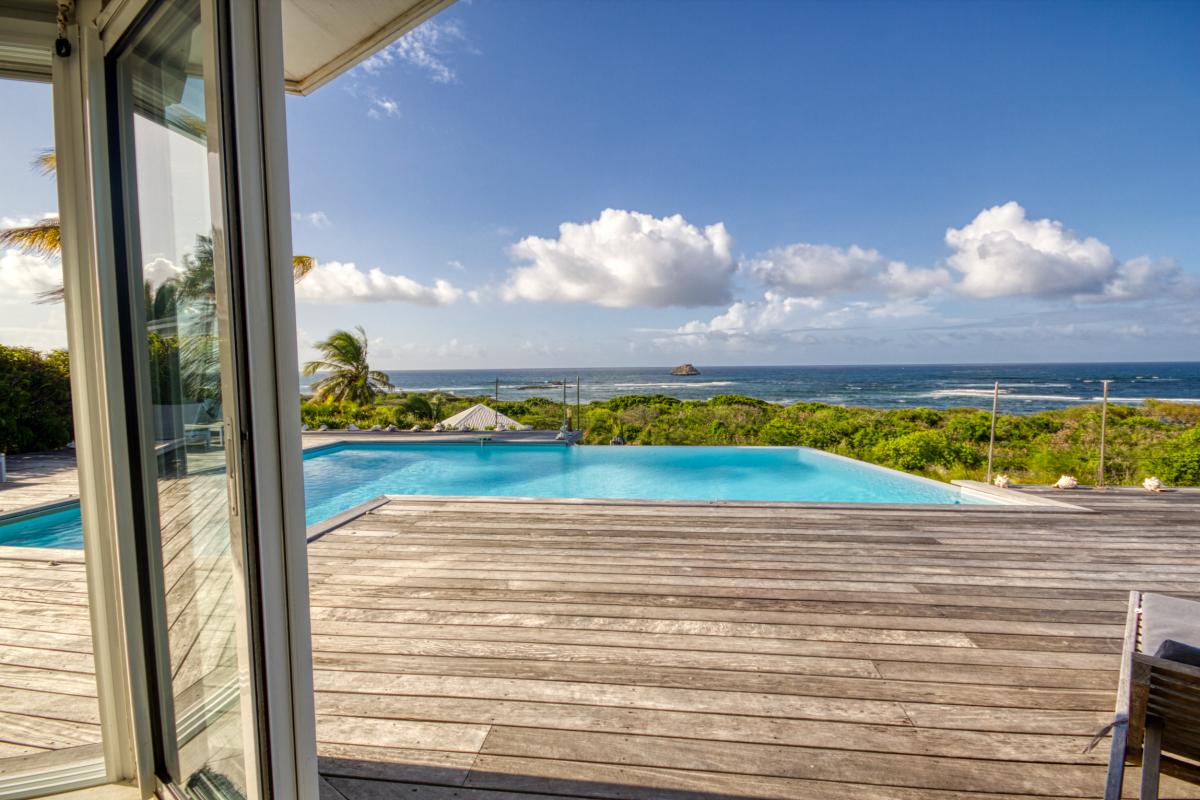 Location villa 3 chambres pour 6 personnes avec piscine vue mer et accés plge anse à la gourde Iguana Bay St François Guadeloupe 