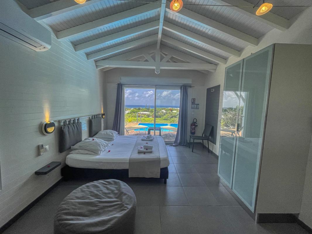 Location villa Guadeloupe Saint François - villa 1 chambre 2 adultes et 1 enfant - piscine et vue mer